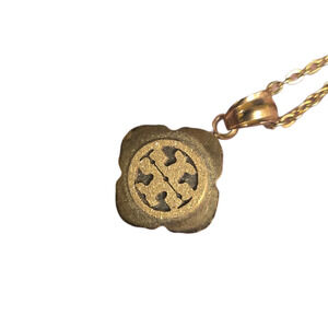 Tory Burch pendant on adjustable gold toned chain